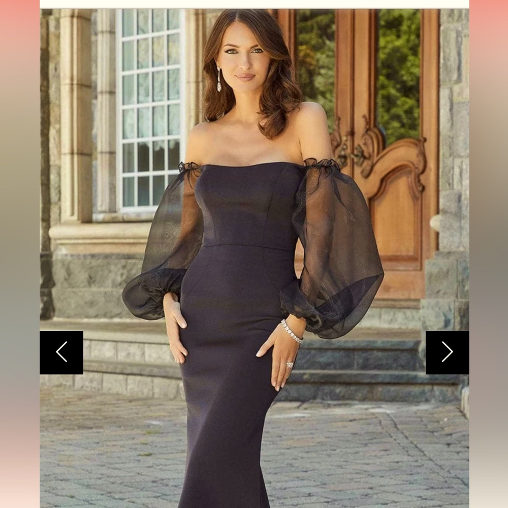 Like new! Worn once for MOG! Beautiful dress for MOB, MOG, any special occasion!